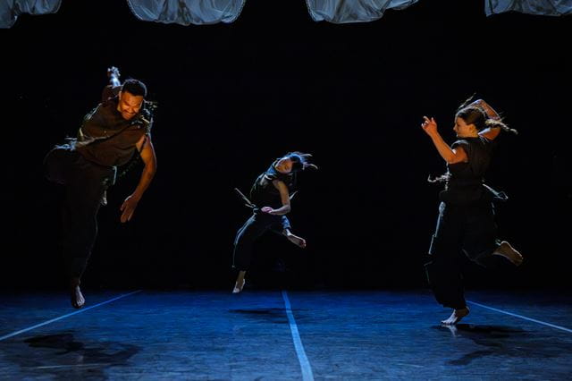 People on stage performing 