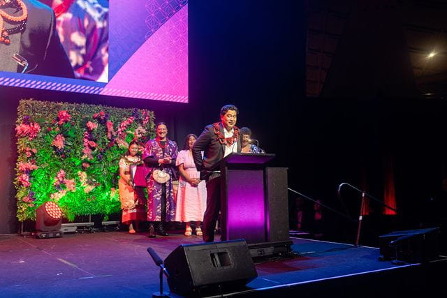 Neil Ieremia receiving the Moana Creative Enterprise Award at the 2022 Pacific Business Trust Awards. Photo supplied.